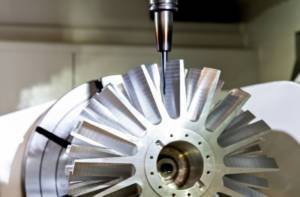Photo of machine tool cutting jet turbine blades
