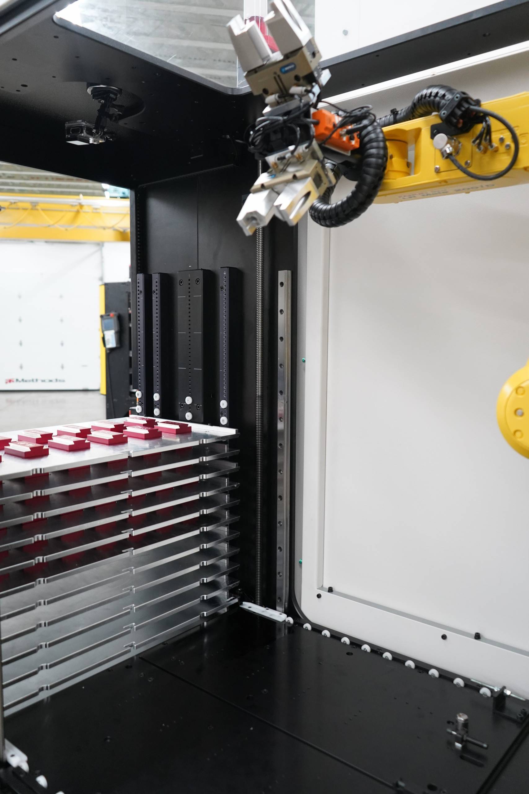 Industrial robotic CNC machine tending automation system from Methods Machine Tools