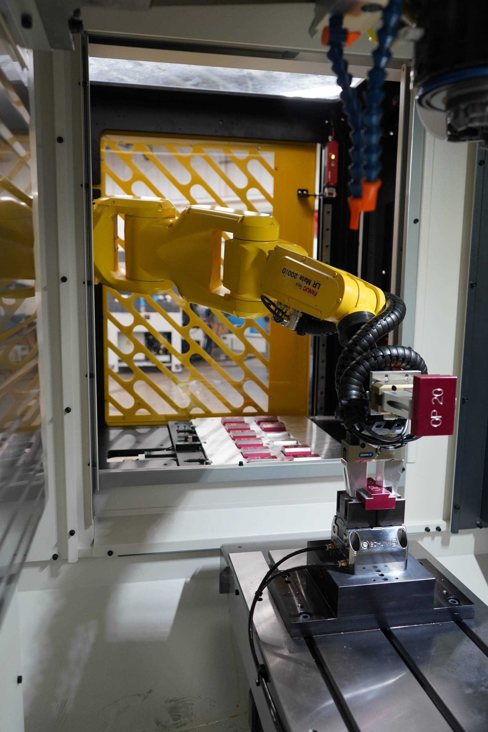 FANUC robotic automation system for CNC machine tending