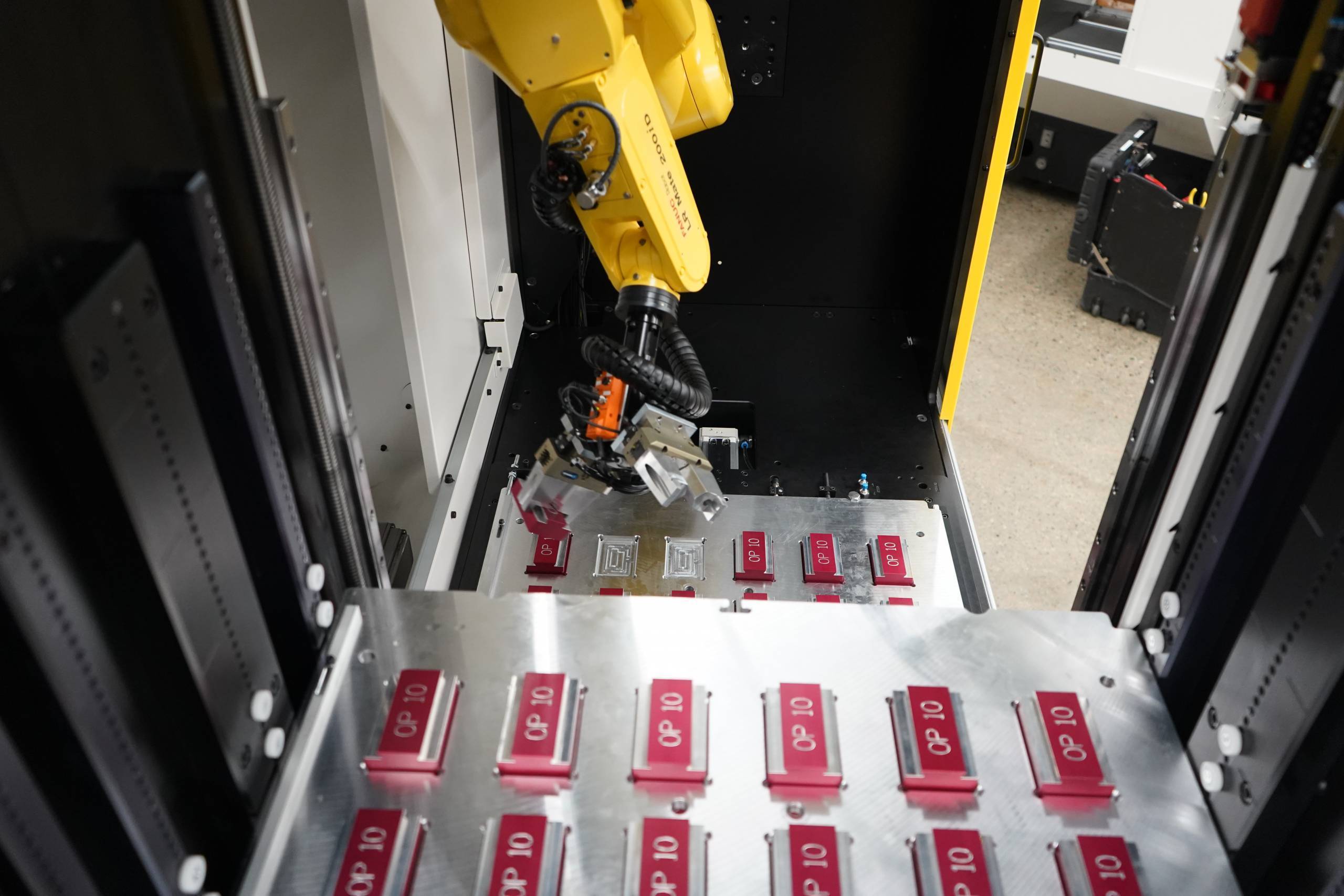 FANUC industrial robot for automated CNC machine tending and manufacturing
