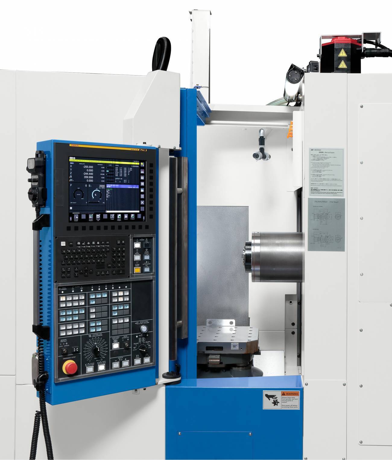 the KIWA KH-4100kai machining center sold by Methods Machine Tools with the front door opened