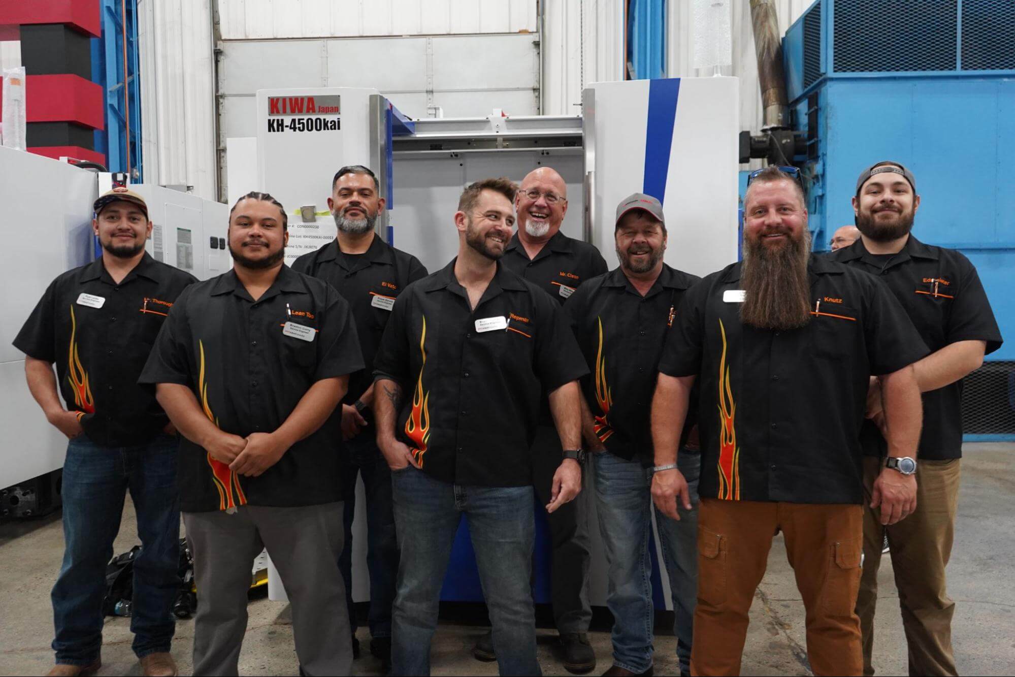 A group of machinists posing for a picture at Methods
