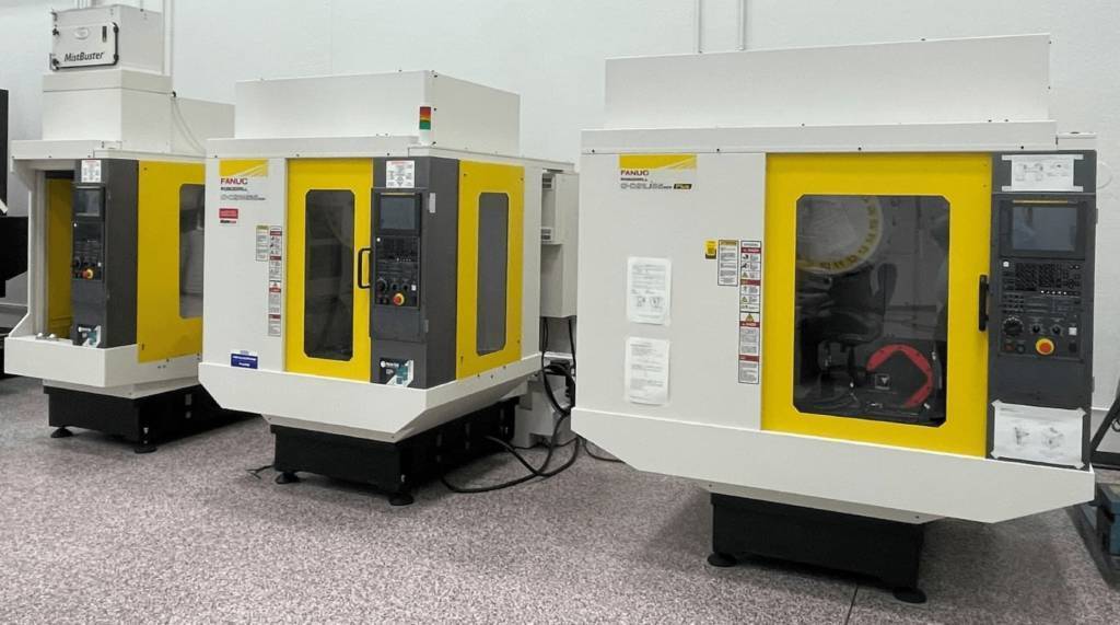 a lineup of several different fanuc robodrill machines sold by methods machine tools
