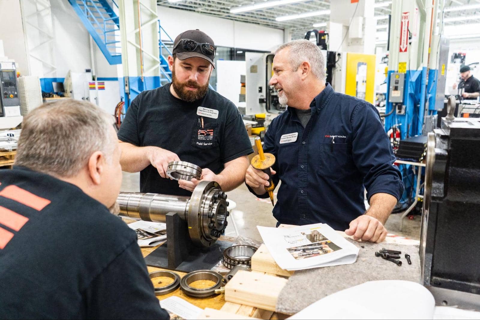 Machinists at work in Method's facility